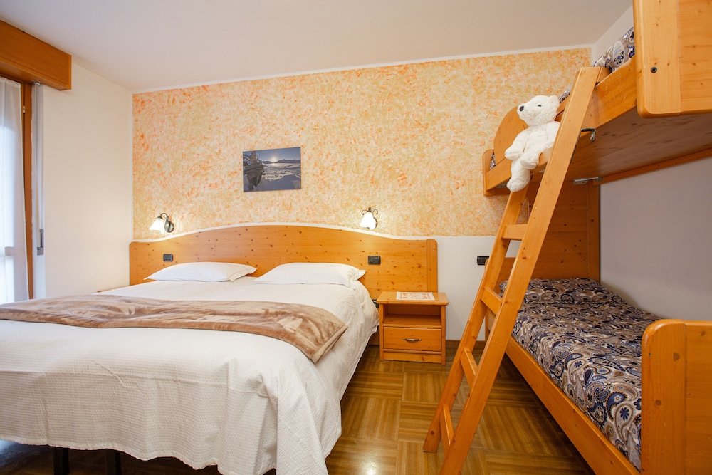 Supérieure quadruple chambre avec balcon et Vue montagne Hotel Biancospino