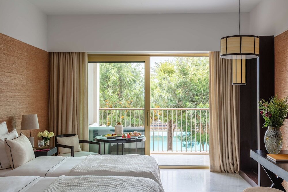 Семейный номер Standard с 2 комнатами с балконом и с видом на бассейн Anantara Vilamoura Algarve Resort
