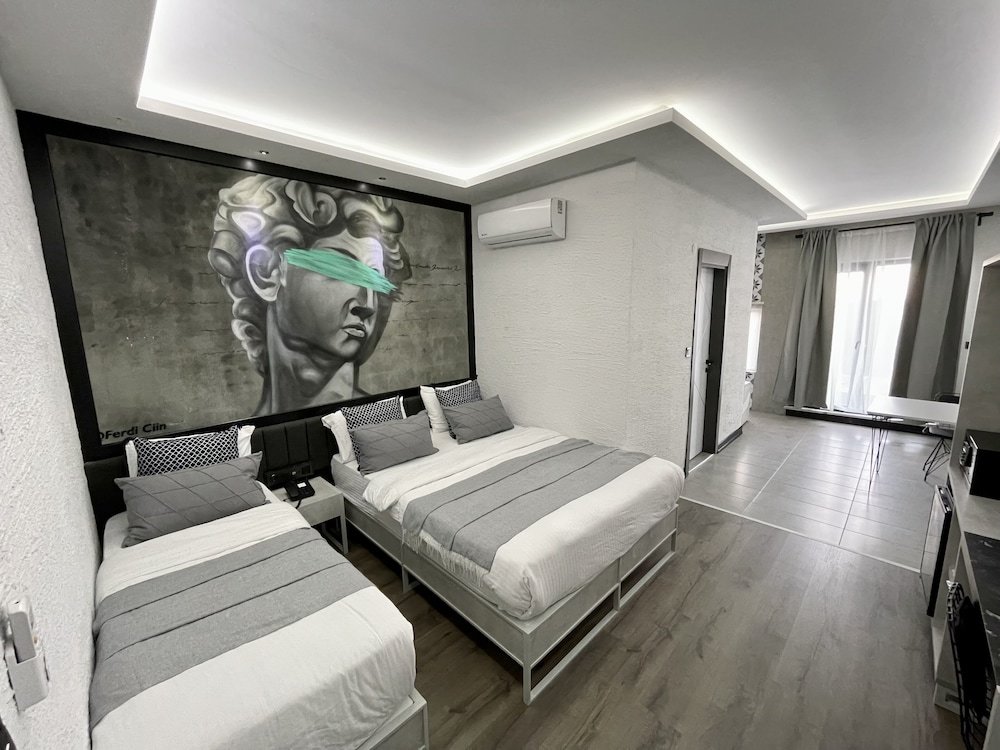 Komfort Dreier Zimmer 1 Schlafzimmer mit Gartenblick Melanj Airport Hotel