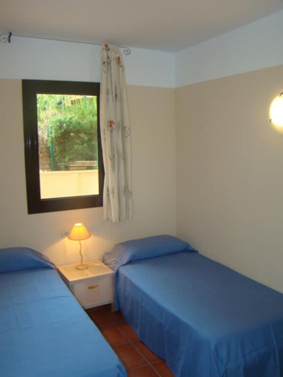 Апартаменты Confortable Bajo de 2 habitaciones Marina Sant Jordi