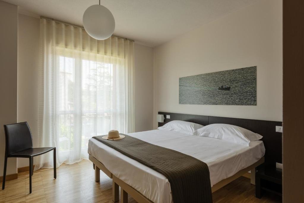 Apartment 1 Schlafzimmer mit Balkon und mit Seeblick Vialeromadodici Rooms & Apartments
