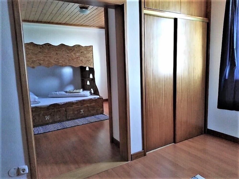 Кровать в общем номере Guest House Host O Morro