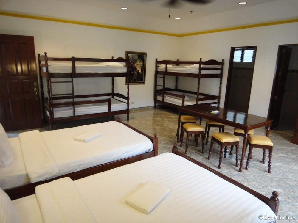 Кровать в общем номере Dolce Vita Hotel