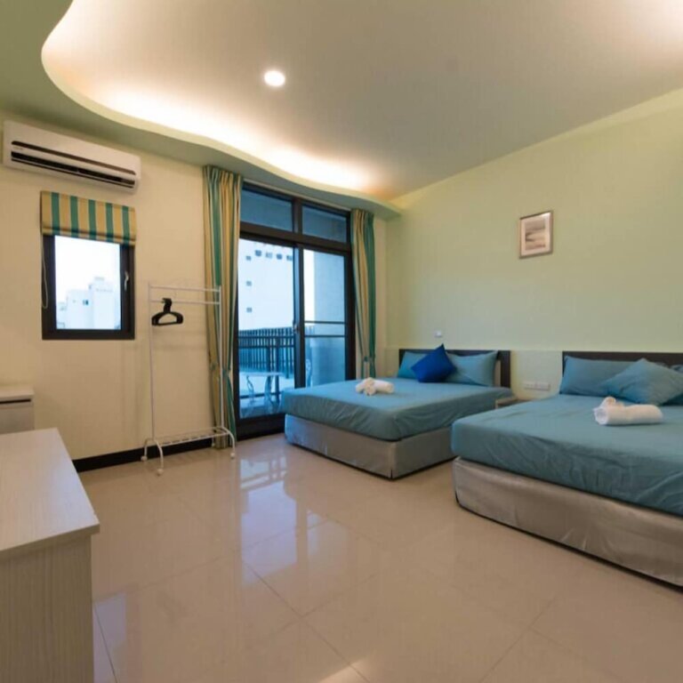 Standard Quadruple room with balcony Kenting Orange Homestay