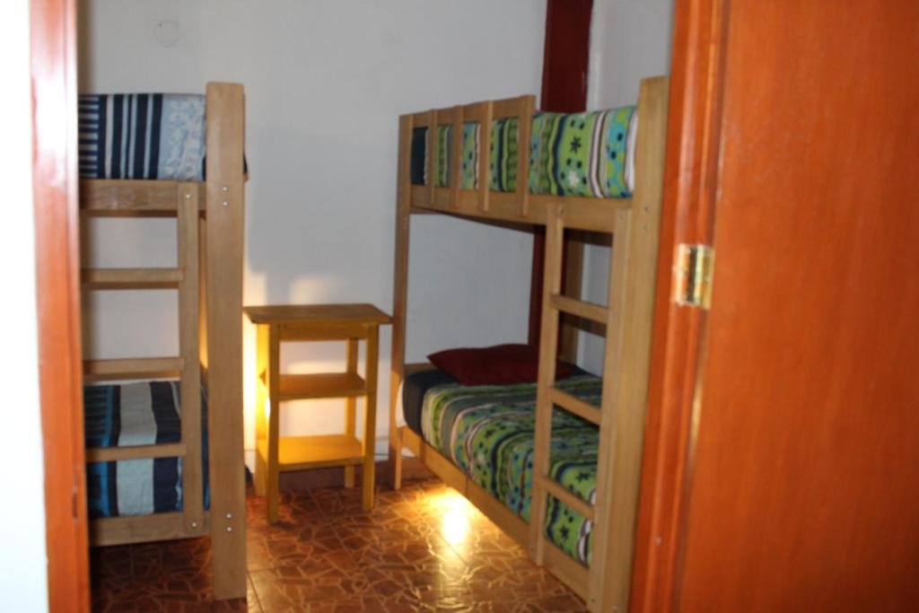Кровать в общем номере Kame House hostel