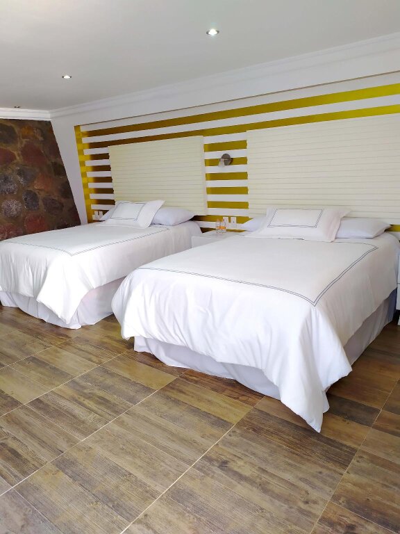 Четырёхместный номер Standard Hotel Tierras Blancas
