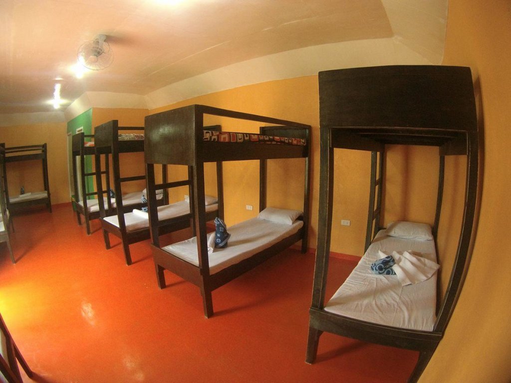 Кровать в общем номере Montenova Hillside Resort