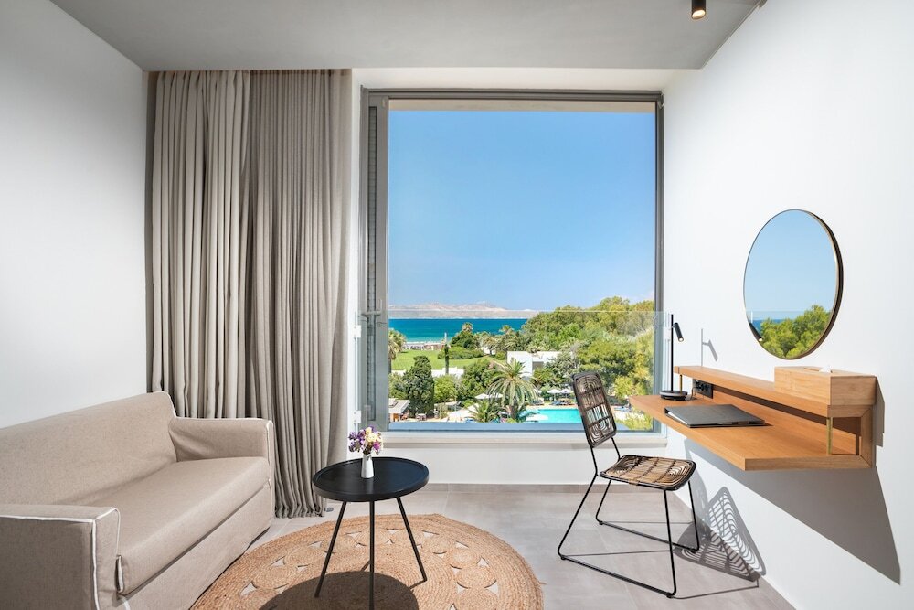 Standard Triple room with sea view Caravia Beach Hotel
