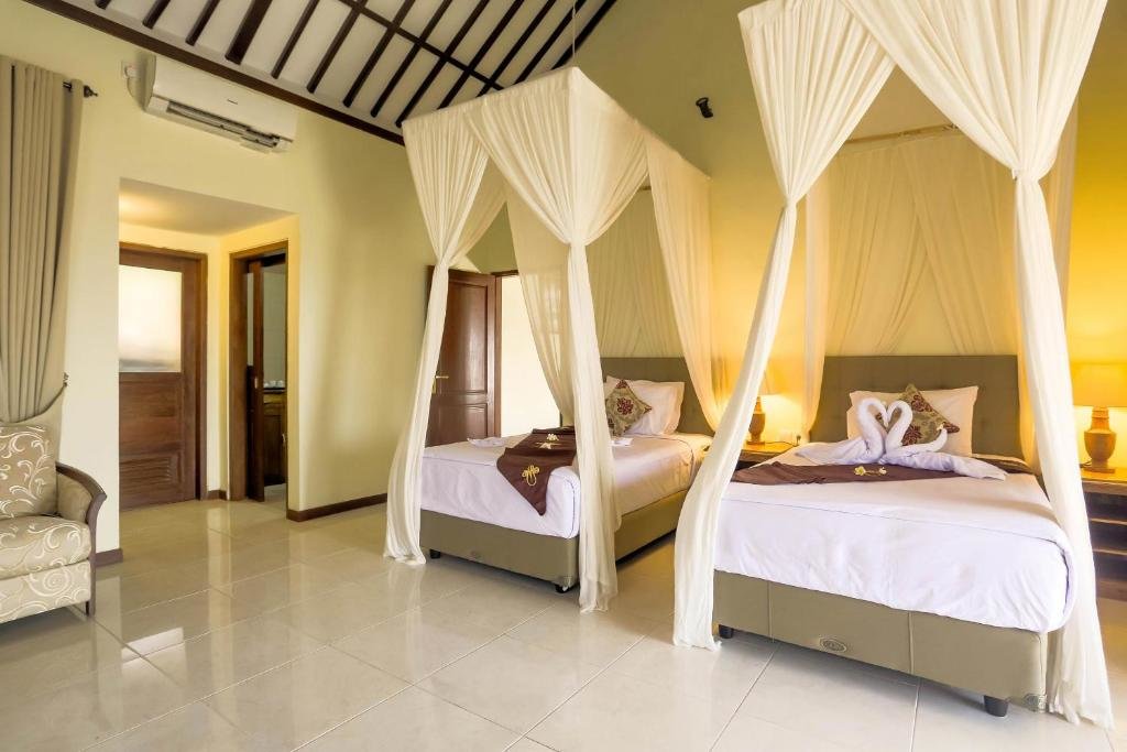 2 Bedrooms Deluxe room with garden view Taman Surgawi Resort & Spa