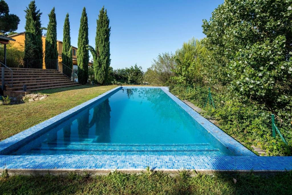Villa Allotjament independent per a famílies amb jardí piscina privats, vistes i gran cuina menjador amb llar de foc