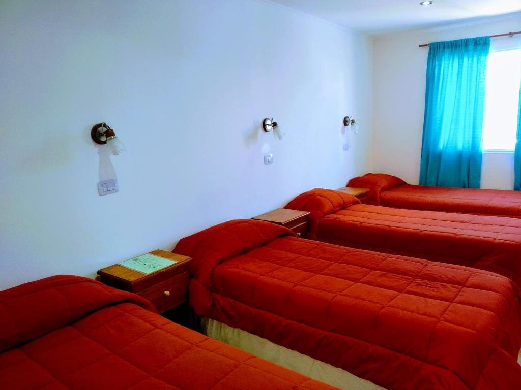 Кровать в общем номере Lo de Guille