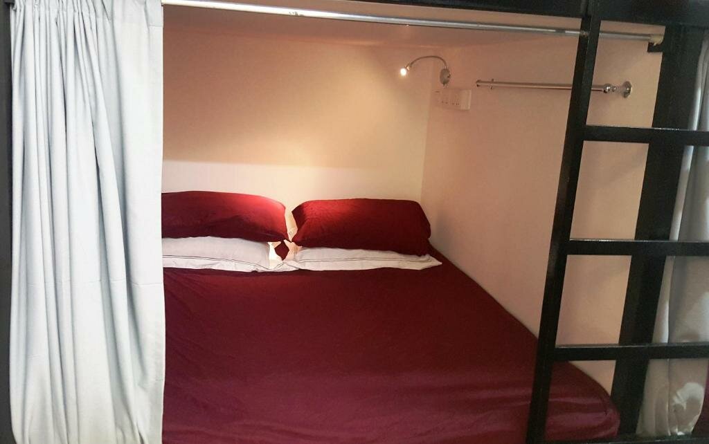 Кровать в общем номере Meadows Hostel