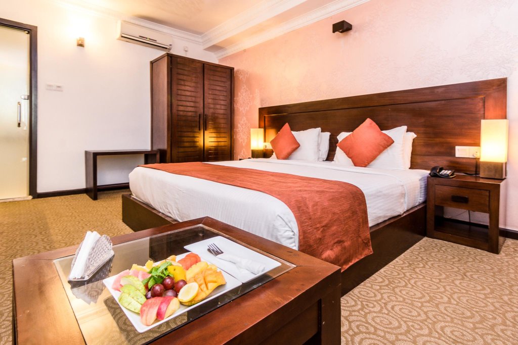 Кровать в общем номере Ceylon City Hotel,Colombo