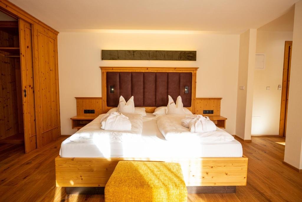 Junior suite con vista sulle montagne Moseralm Dolomiti Spa Resort