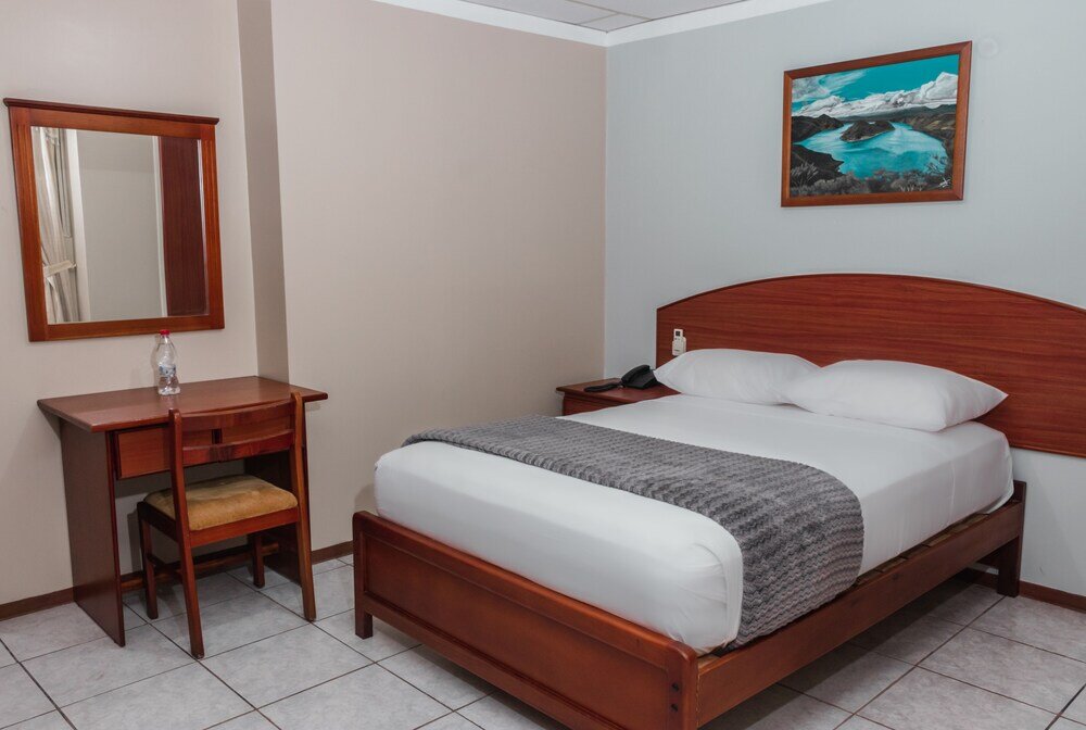 Bett im Wohnheim Grand Hotel Machala