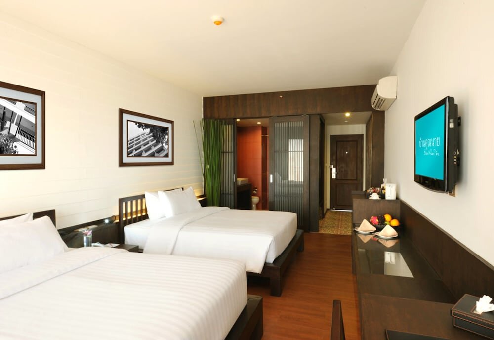 Четырёхместный номер Deluxe c 1 комнатой с балконом Baan Khun Nine