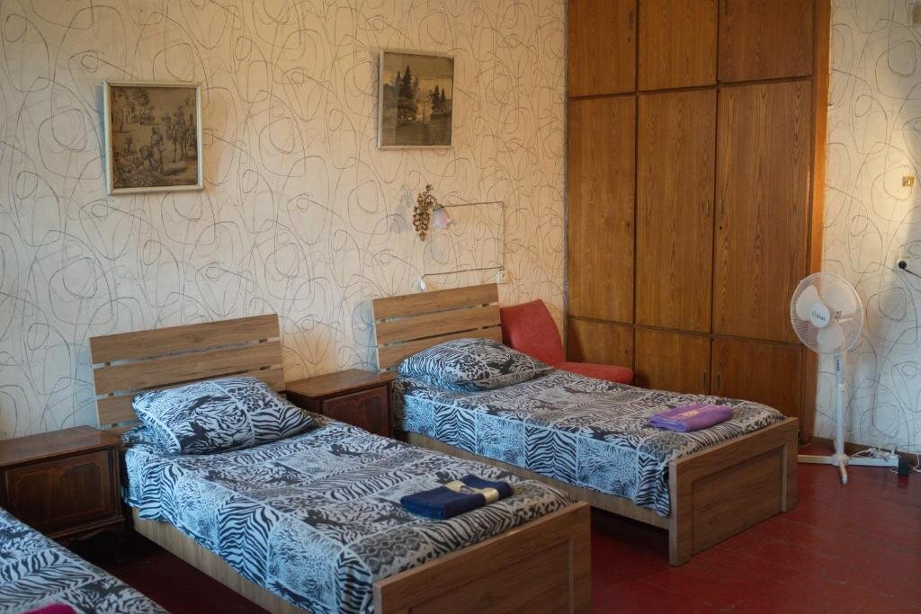 Кровать в общем номере Suzi Hostel