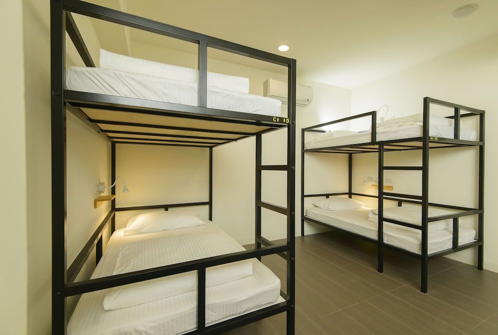 Кровать в общем номере 客旅家青年旅館 Travelers Plus