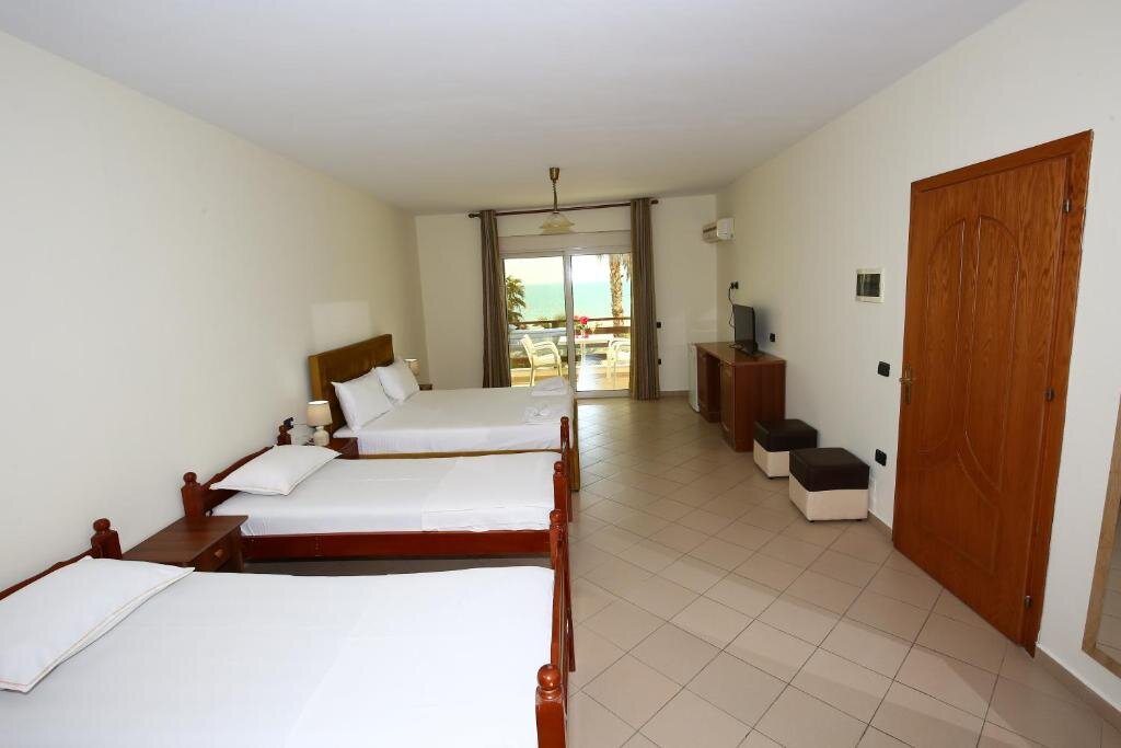 Standard Quadruple room with sea view Hotel Venezia