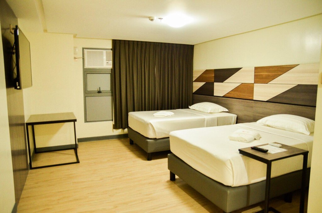 Deluxe chambre Travelite Hotel Legarda
