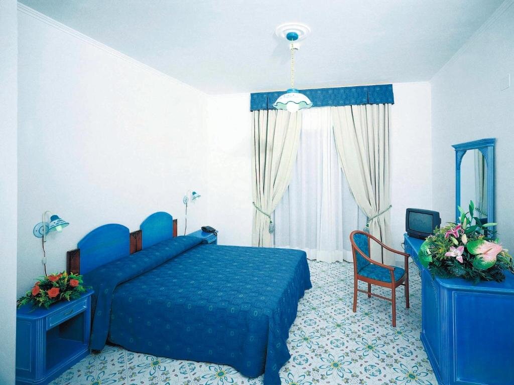 Standard quadruple chambre Hotel Club Residence Martinica
