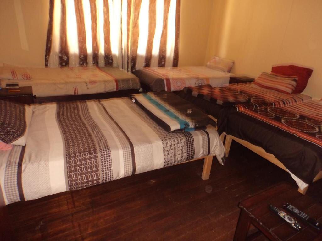 Кровать в общем номере Namibia Skipper Services