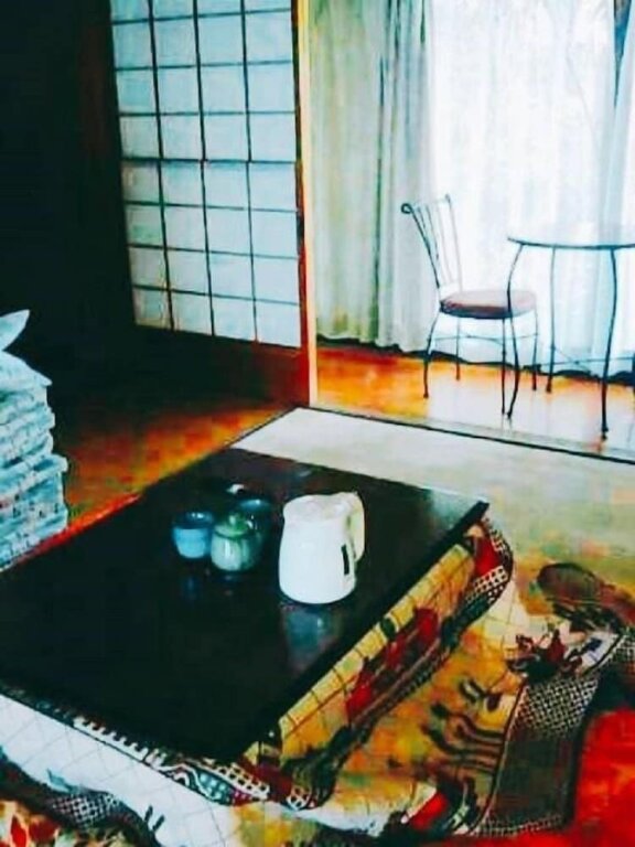 Cama en dormitorio compartido Minsyuku KOCHIHIRA