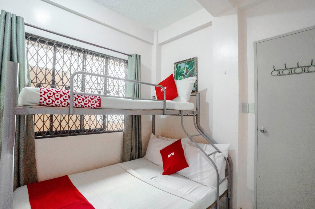 Кровать в общем номере OYO 748 Baguio Transient Dot Com
