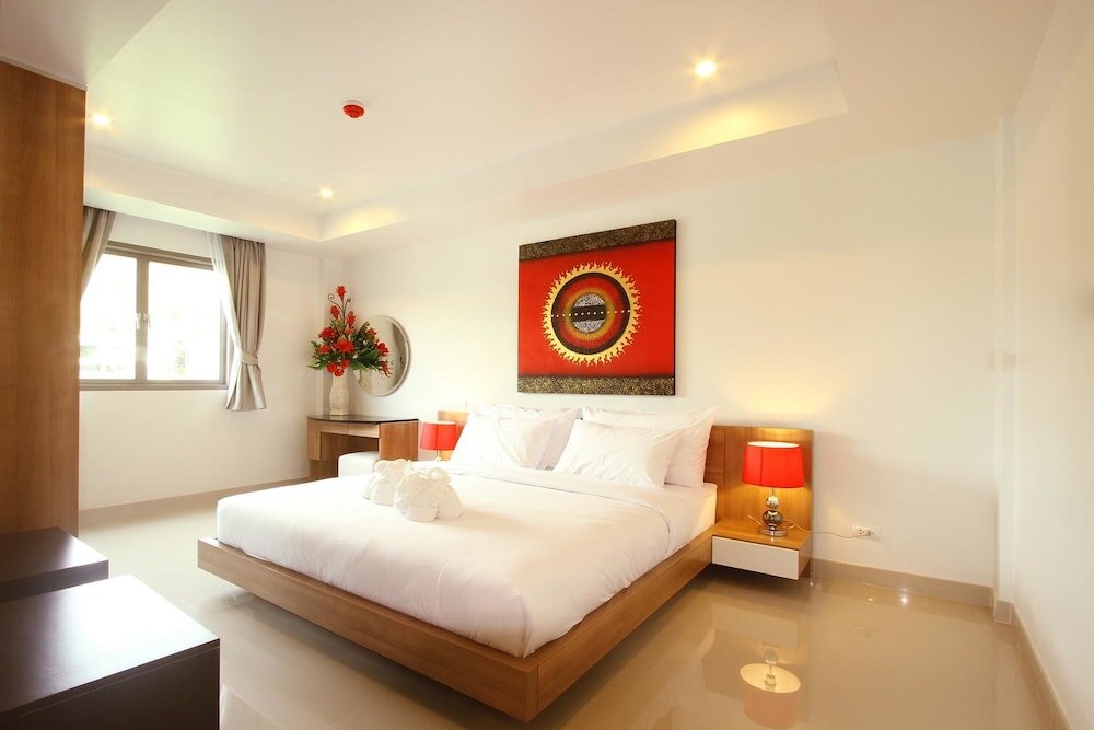Suite 1 dormitorio con balcón Surin Sabai