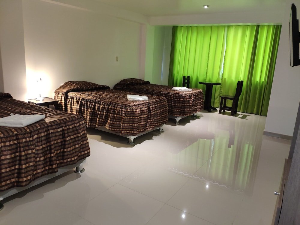 Standard Triple room with mountain view Hostal Quilla