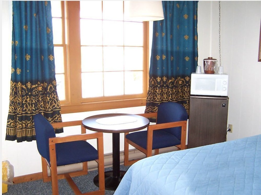 Standard quadruple chambre Eastview Motel