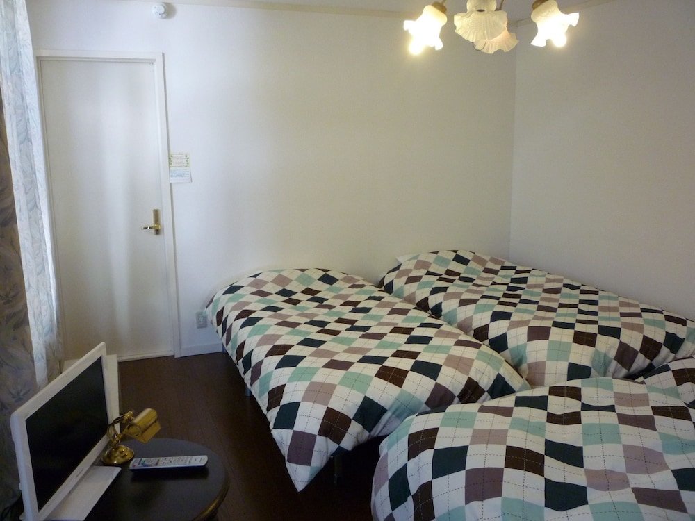Économie quadruple chambre Guest House Gekka - Hostel