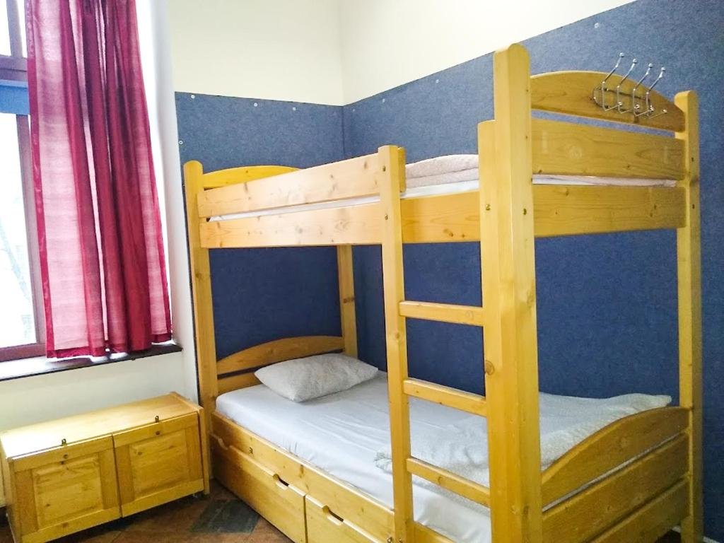 Кровать в общем номере Music Hostel Piotrkowska