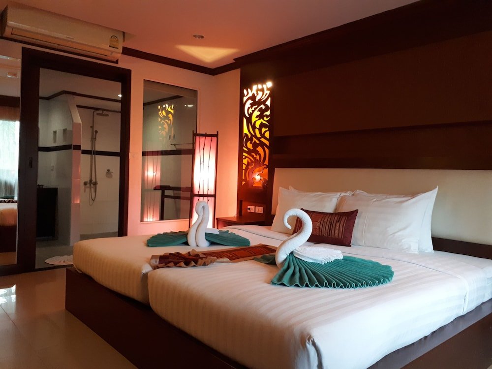 Habitación doble De lujo con balcón y con vista a la piscina Chivatara Resort & Spa Bang Tao Beach