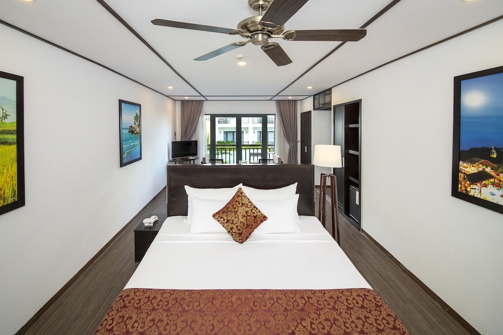 Standard Family room with balcony and with pool view Golden Pearl Hoian Hotel