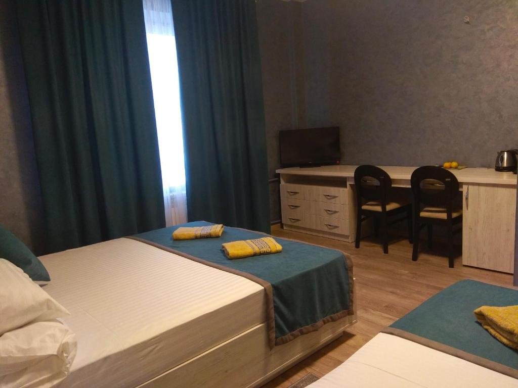 Confort triple chambre Rivne Hostel