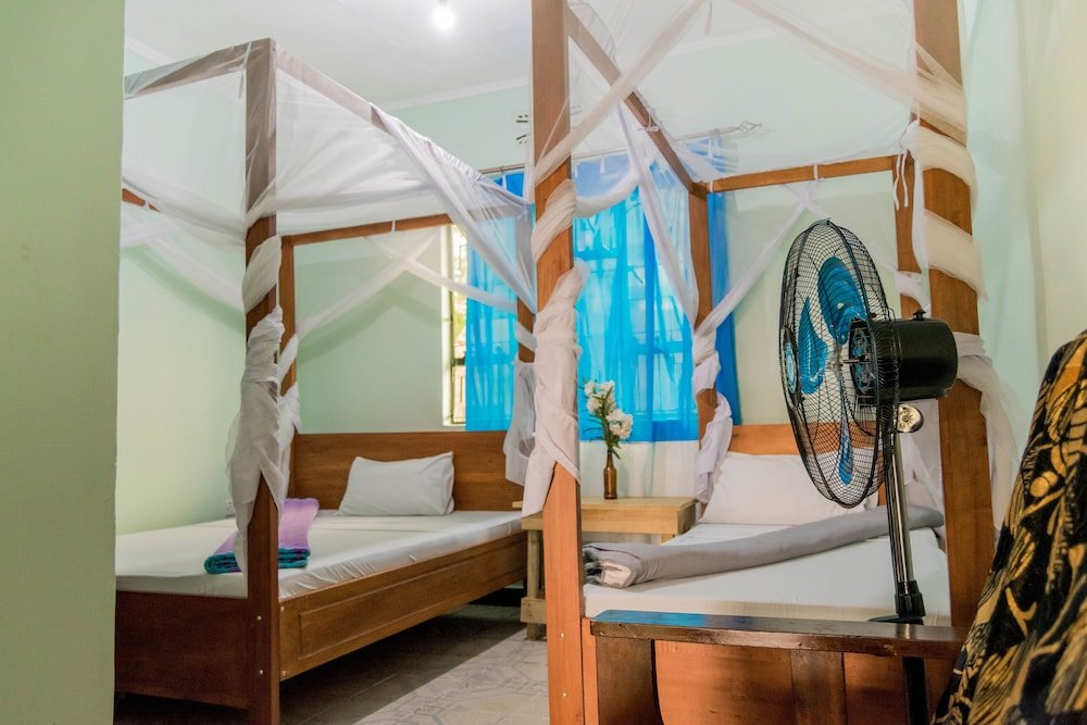 Confort triple chambre Kilimanjaro Summit Lodge
