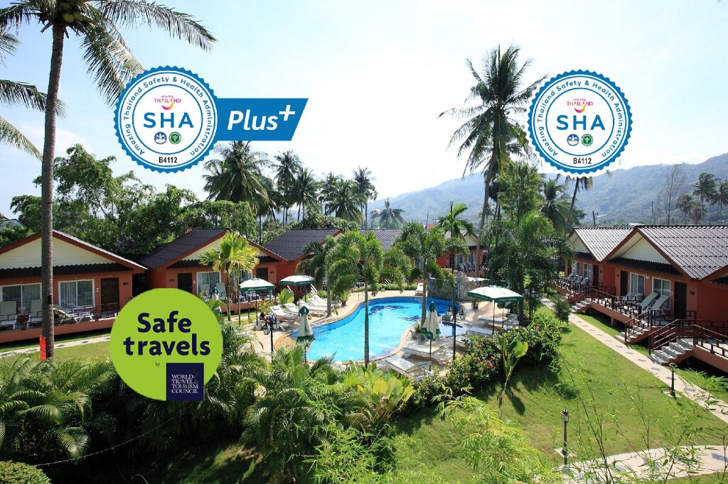 Кровать в общем номере Andaman Seaside Resort - SHA Extra Plus