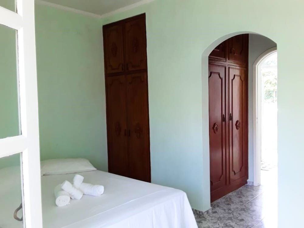 Standard Quadruple room with balcony Pousada Recanto do Mar Casado