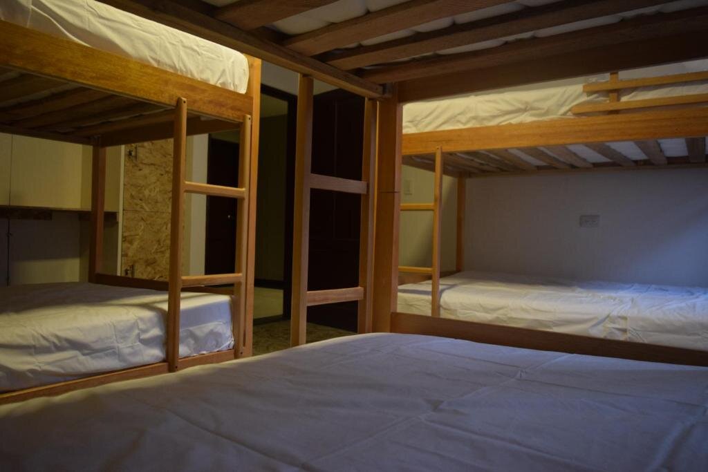 Кровать в общем номере Les Balcons Hostel
