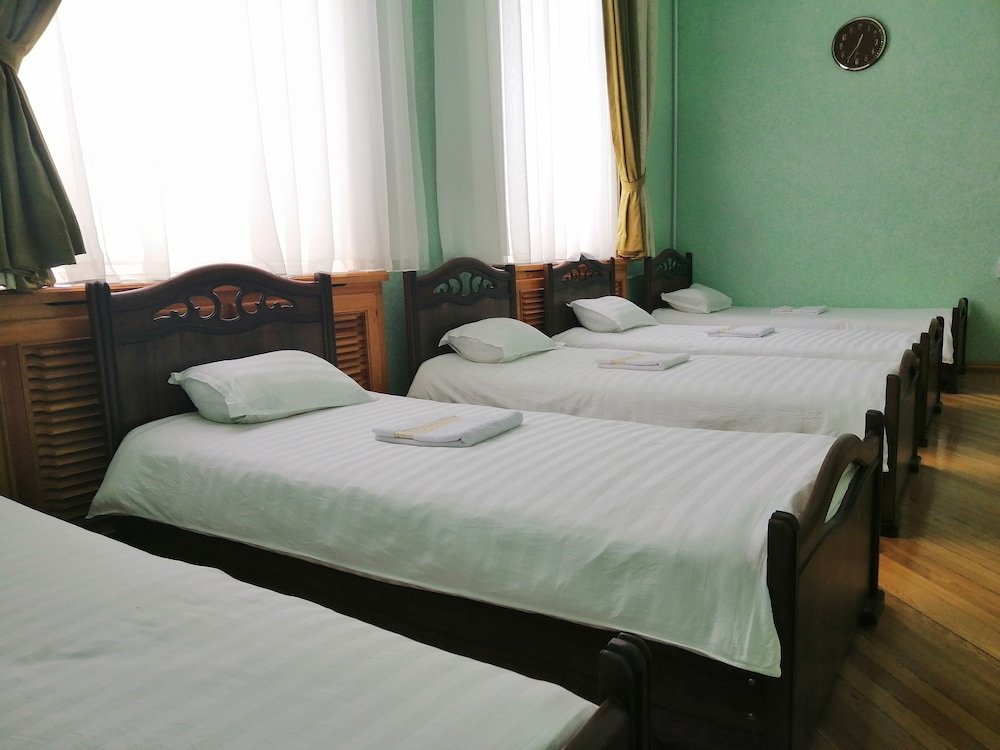Кровать в общем номере (мужской номер) Rakat Hostel
