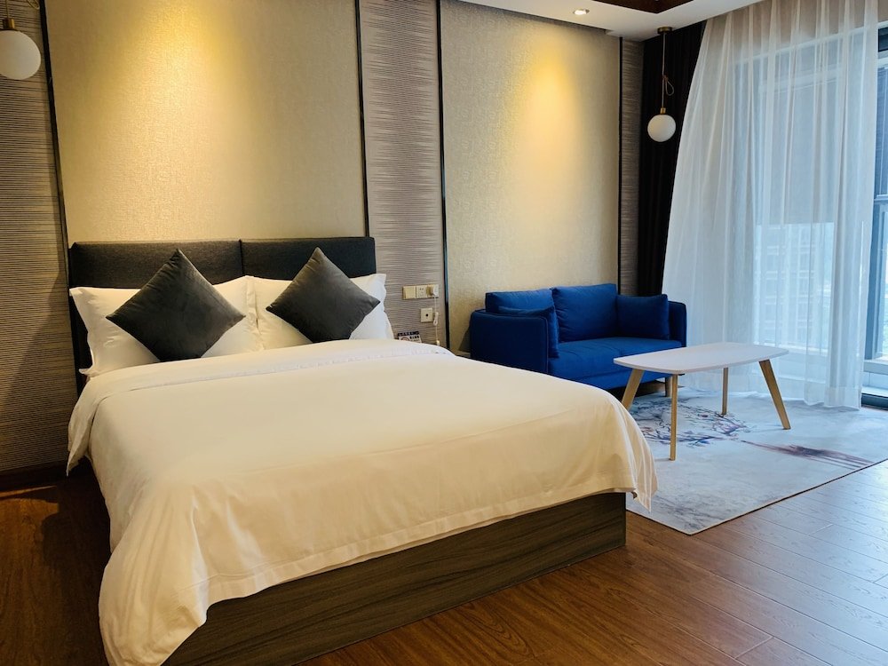 Апартаменты Comfort Xingyu Xingxiang Apartment Hotel