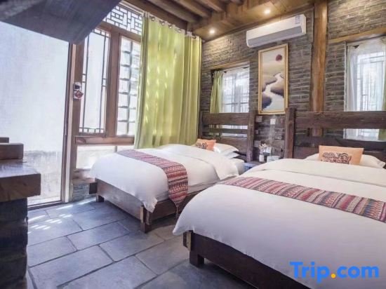 Suite Lijiang Sunshine Inn - Lijiang Yi Xiang Qing Yuan Inn