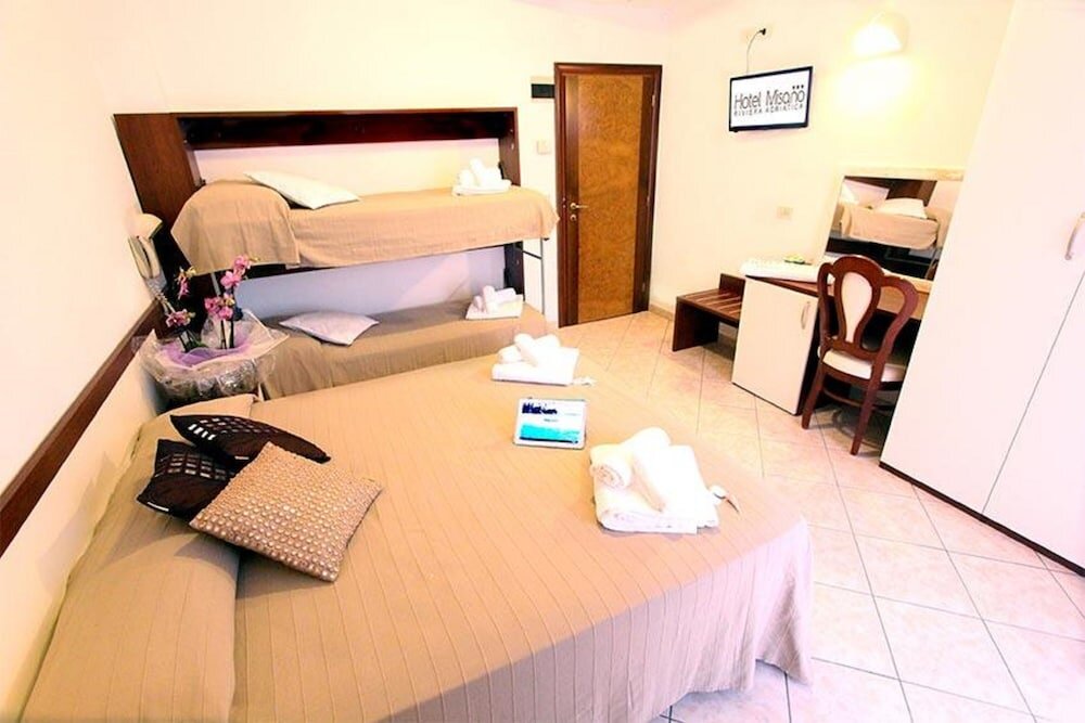 Standard quadruple chambre Hotel Luciana