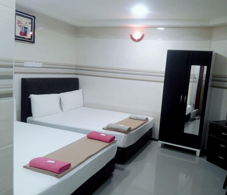 Standard quadruple chambre New Wave Sungai Buloh Hotel