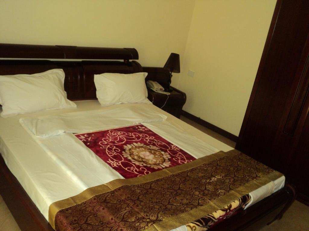 Deluxe chambre Biraj International Hotel