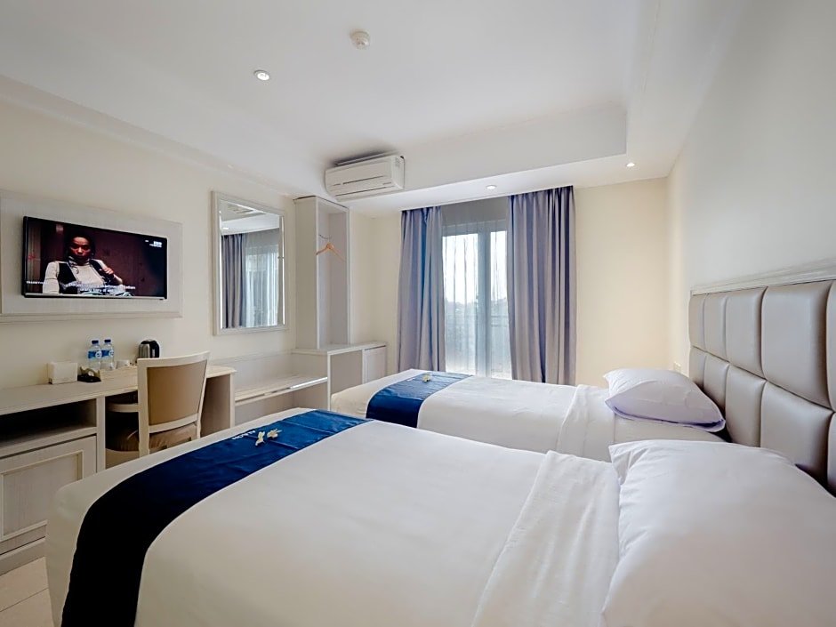 Deluxe Double room Alron Hotel Kuta Powered