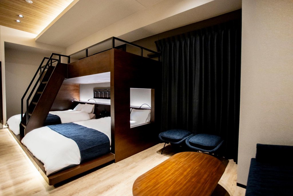 Кровать в общем номере FAV HOTEL TAKAMATSU