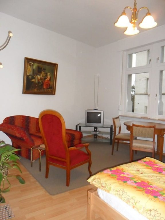 Четырёхместные апартаменты с 2 комнатами Pension Hans Rastatt