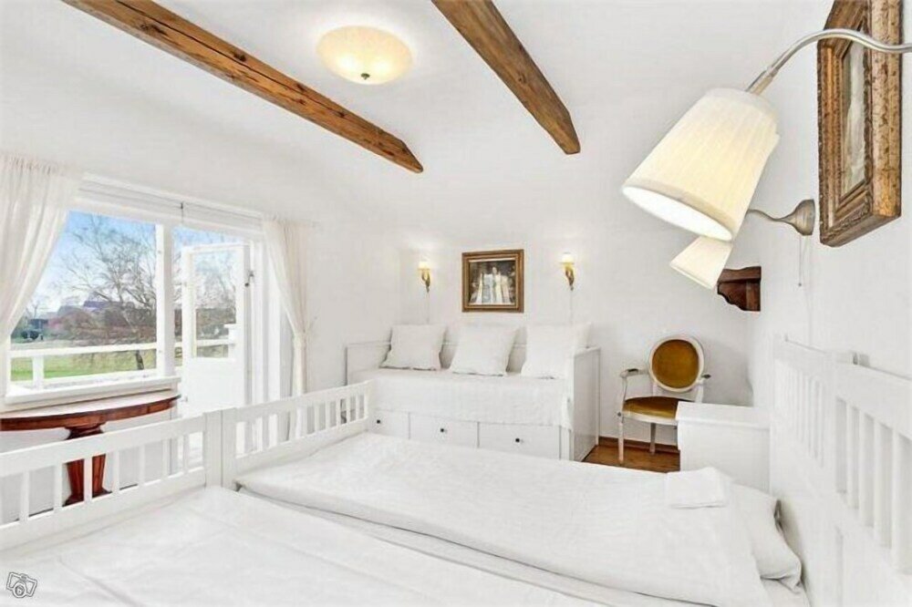 Standard quadruple chambre avec balcon Kullabygdens Bed & Breakfast